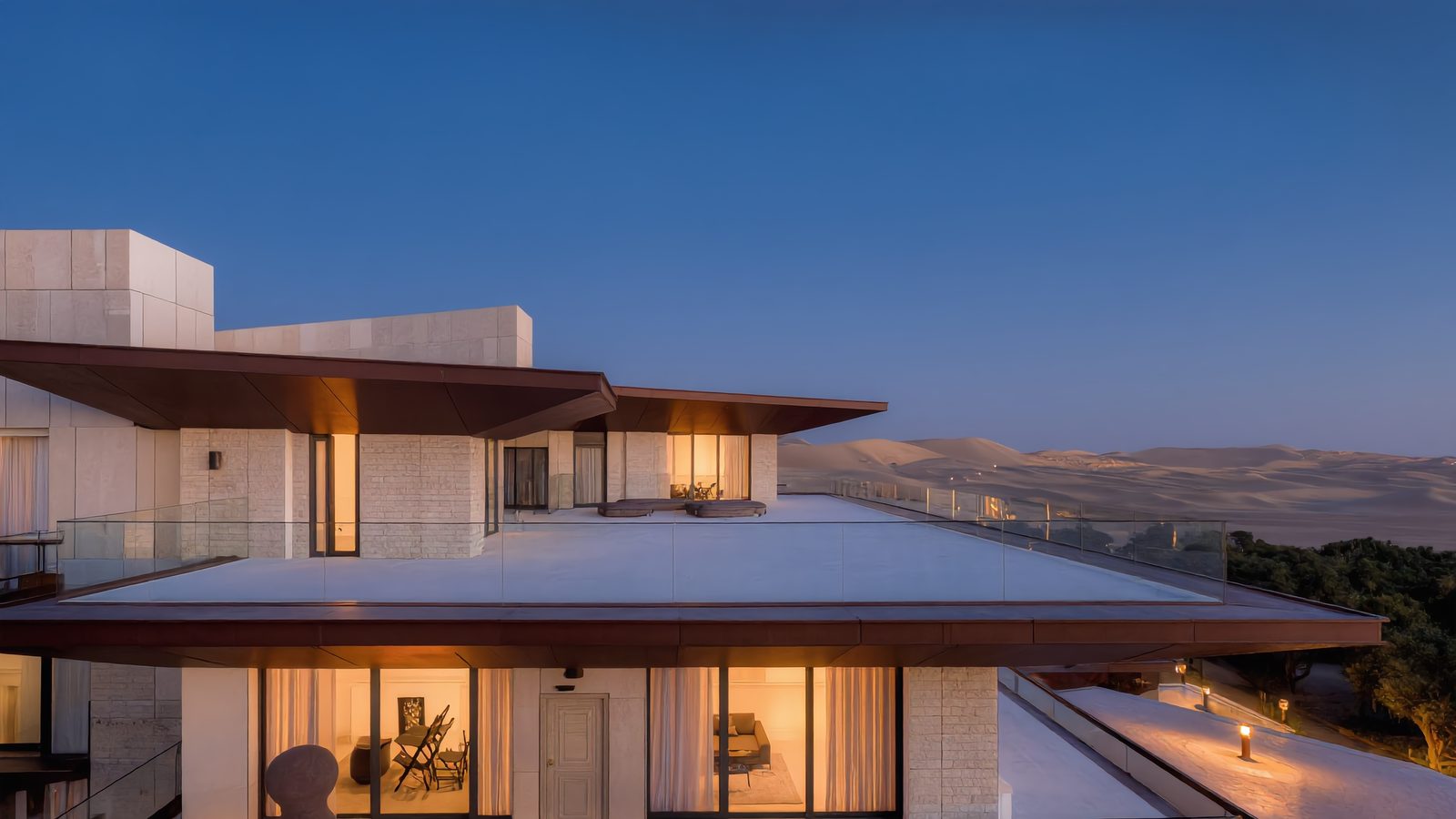 The penthouse terrace at dusk