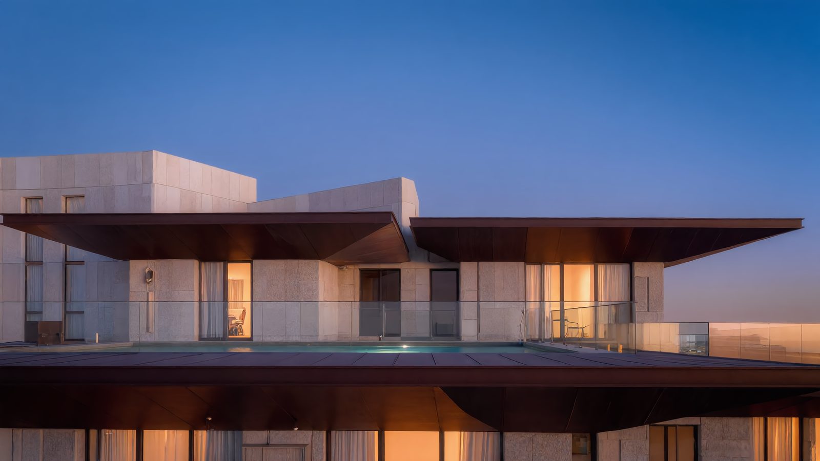 A ridge villa on the top level, the dunes behind it